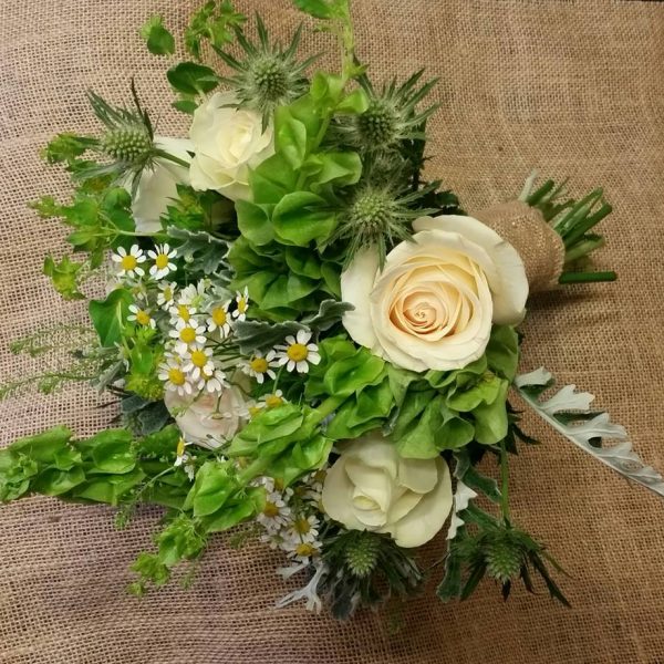 Image of a white and green tones bridal bouquet in a country style