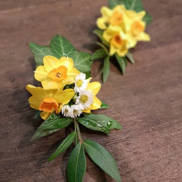 Image showing yellow daffodil and daisy buttonholes by Adonis