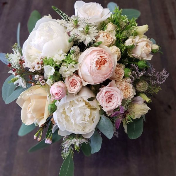 image of a peony and garden rose bouquet in pink and pastel tones