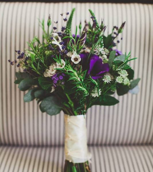 image of a compact purple and white tones bridal bouquet by Adonis