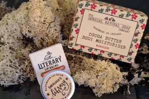 Image of the juicy duo gift set featuring a lip balm by literary lip balms, and body moisturising bar by the Donegal natural soap company