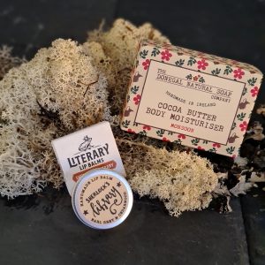 Image of the juicy duo gift set featuring a lip balm by literary lip balms, and body moisturising bar by the Donegal natural soap company