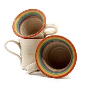 image of rainbow handcrafted mugs by Irish supplier TomPow pottery