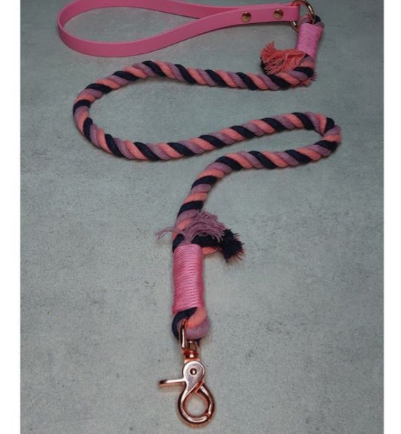 Image of a black, purple and pink handcrafted dog lead by Irish supplier Woodles